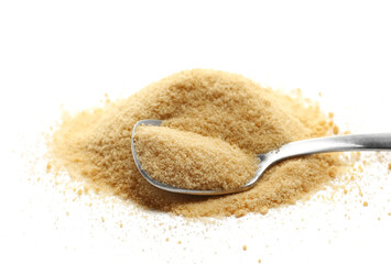 Brown sugar pile in metal spoon isolated on white background, sugarcane, clipping path
