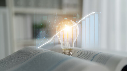 A lightbulb rests on an open book, symbolizing knowledge and ideas. In the background, growth charts emerge, reflecting innovation and business expansion. Impute