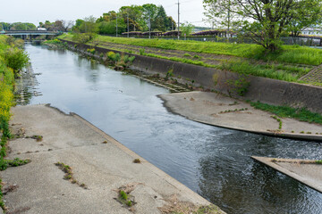 Nishitakase River canal next to Toba Water Environment Conservation Center, a facility for water management and sewage treatment. Kyoto, Japan.
