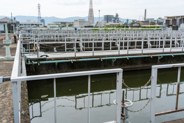 Industrial wastewater treatment and water purification facility with sedimentation tanks at Toba Water Environment Conservation Center. Kyoto, Japan.