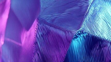 Close up view of textured futuristic surface illuminated with vivid cyan and magenta light