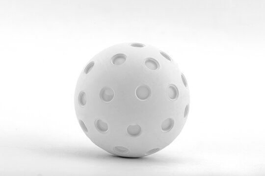 White Pickleball on a white background.
