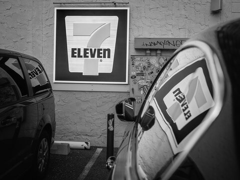 7-Eleven Store Sign Seen From Parking Area, New York