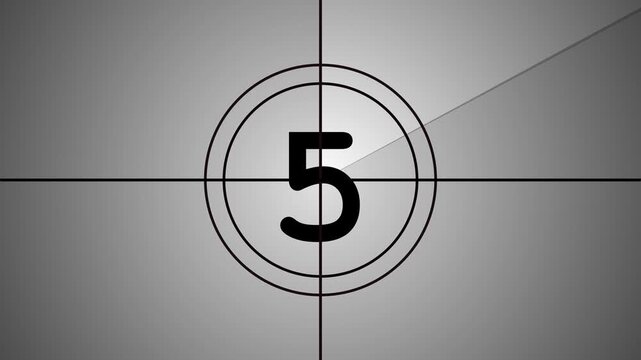Vintage, old, projected film head leader with realtime countdown clock. Worn and damaged in style including marks, scratches and film grain to add a vintage look to your video. 4k video.