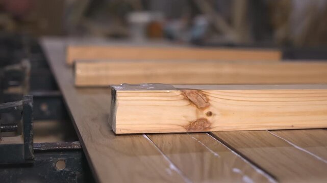 Close View Of Hands Organizing Completed Wood Panels On Production Conveyor Belt For Transporting. Media