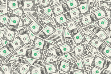 Background of scattered one US dollar bills money texture