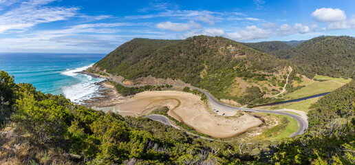 Stunning cliffs and rolling waves define this iconic landscape along the Great Ocean Road,...