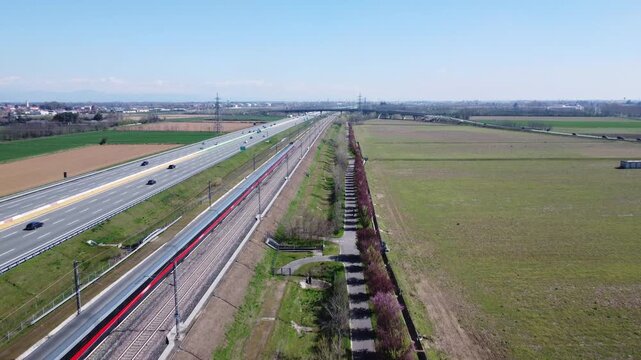 Aerial view of the highway and high speed rail near Milan, Italy
