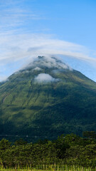 Fototapeta premium Clear View of a Majestic Arenal Volcano Seen from Monteverde in the Tropical Highlands of Costa Rica