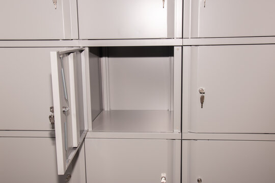 Metal safe box panel wall with open one. Concept for security and banking protection.