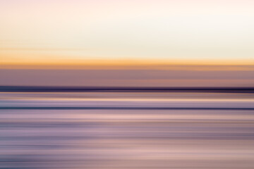 Soft pastel tones and smooth waves form a minimalist horizontal seascape.