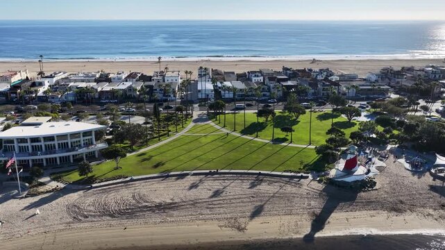 Aerial footage along the coastline and Newport Bay at Marina Park in Newport Beach California USA