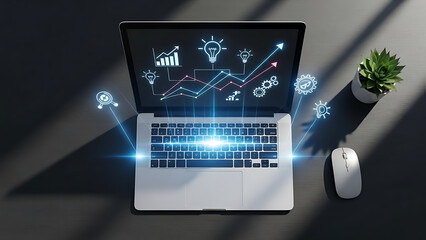 A laptop computer displays business data and graphs on its screen in a dark room