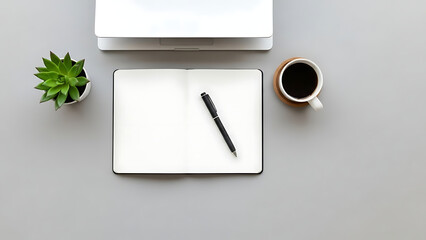 A minimalist workspace with a laptop, notebook, and coffee on a gray desk