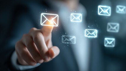Business professional interacting with a virtual email interface symbolizing modern digital communication and messaging systems.

