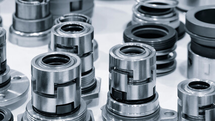 A collection of metal chucks for holding drills and milling cutters in metalworking CNC machines, industrial metalworking concept background © Aleksandr Matveev