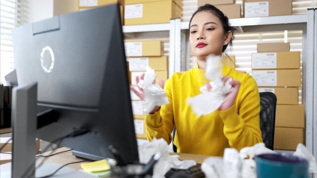 Label printer malfunction on work desk while stressed warehouse owner faces business problems and operational failure in storage office