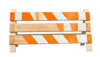 Orange & white striped barrier used at a construction site, isolated on a black background