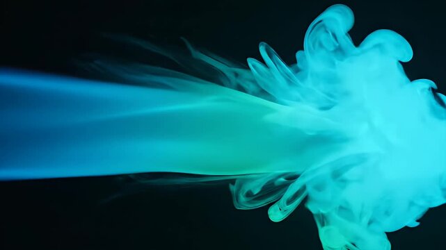 Dynamic teal and blue smoke plume expanding against dark background. Ethereal abstract visual flow of vibrant gaseous energy showcasing fluid motion and artistic beauty