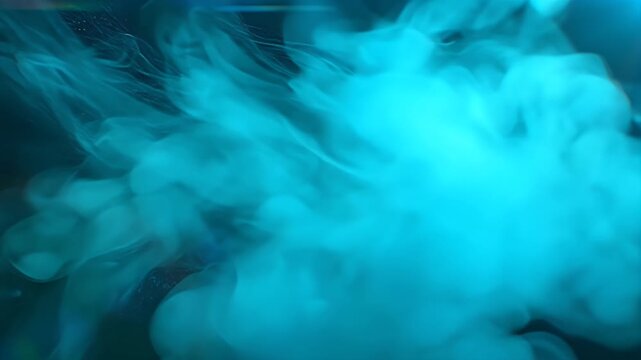 Abstract blue smoke swirling and creating ethereal, mystical patterns in atmospheric lighting for a sense of mystery and wonder