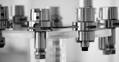 A series of metal chucks for mounting drilling and milling tools in modern metalworking CNC programmable multifunctional machines, industrial concept background