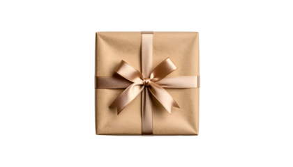 Overhead view of a square gift wrapped in brown paper with a gold ribbon and bow