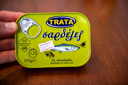 Karkinagri, Greece - June 1, 2023: Sardines in olive oil can Greek brand product by Trata canned traditional food macro closeup