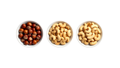 Three white bowls, each containing a different variety of nuts, set against a black backdrop