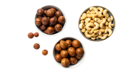 Three bowls of nuts with varied appearances, a dark background creates striking contrast