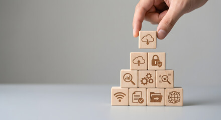 wooden blocks with technology and internet icons