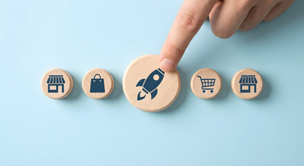 hand pushing wooden button with rocket icon for business growth