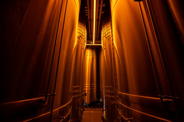 Visit of modern underground caves with steel tanks for fermentation and oak barrels for aging og wine, traditional method making champagne sparkling wine in Reims, Champagne, France