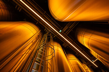Visit of modern underground caves with steel tanks for fermentation and oak barrels for aging og wine, traditional method making champagne sparkling wine in Reims, Champagne, France