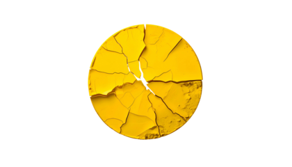 Close-up of a cracked yellow circle isolated on a stark black background