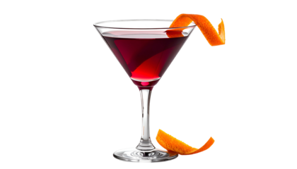 A classic cocktail in a stemmed glass with a vibrant orange peel garnish against black