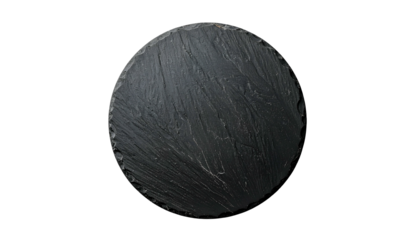 Circular, textured, dark gray slate board isolated on a black background, top-down view