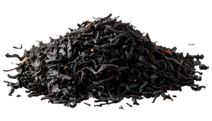 Pile of loose, dark, dried tea leaves against a black background