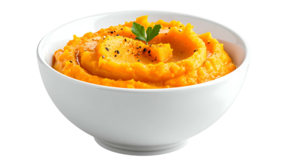 A bowl of vibrant orange mashed food with a garnish, presented on a white bowl