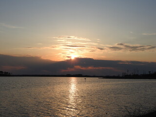Naklejka premium The tranquil beauty of the wetland scenery, during a colorful sunset. Blackwater National Wildlife Refuge, Dorchester County, Cambridge, Maryland.