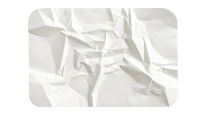 Close-up of a crumpled, rectangular piece of white paper with rounded corners