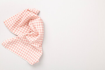 Kitchen napkin on color background, top view