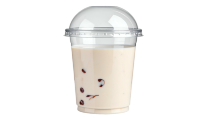 A clear plastic cup filled with a creamy drink, topped with a domed lid