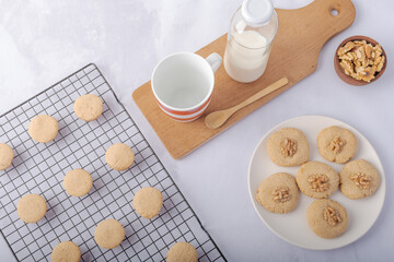 Homemade cookies and a bottle of milk.