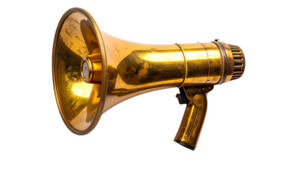 A gleaming gold megaphone rests against a black backdrop, reflecting light