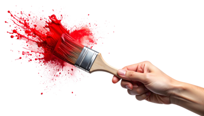 A hand holds a paintbrush, splattering vibrant red paint against a stark black background