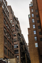 Lower Manhattan street intersection with historic office towers in New York City