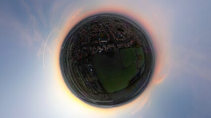 A tiny planet view of a sunrise on a frosty morning over Moorends in South Yorkshire, UK