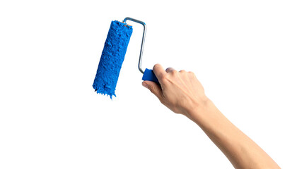 A hand holds a blue paint roller, isolated on a black background, as if painting