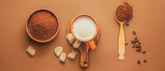 Composition with ingredients for coffee on color background © Pixel-Shot