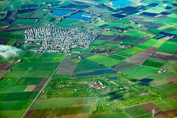 aerial of river Rhine at village of B&uuml;ttelborn with fields and lakes